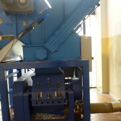 Shredding plant for waste sheets.