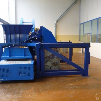 Shredding plant for waste sheets.